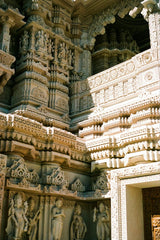 Tara-mae Miller - A close up of a building with sculptures on it photo