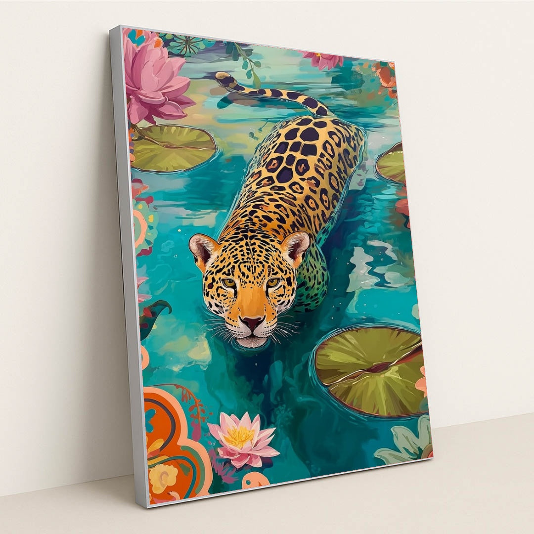 This artwork shows a colorful illustration of a jaguar swimming in a pond with water lilies and vibrant floral patterns, in a silver frame.