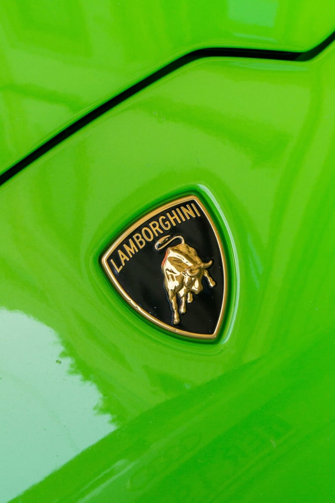 Lambo Gold on Green, iconic Lamborghini emblem on vibrant lime green supercar, perfect for car wall art.