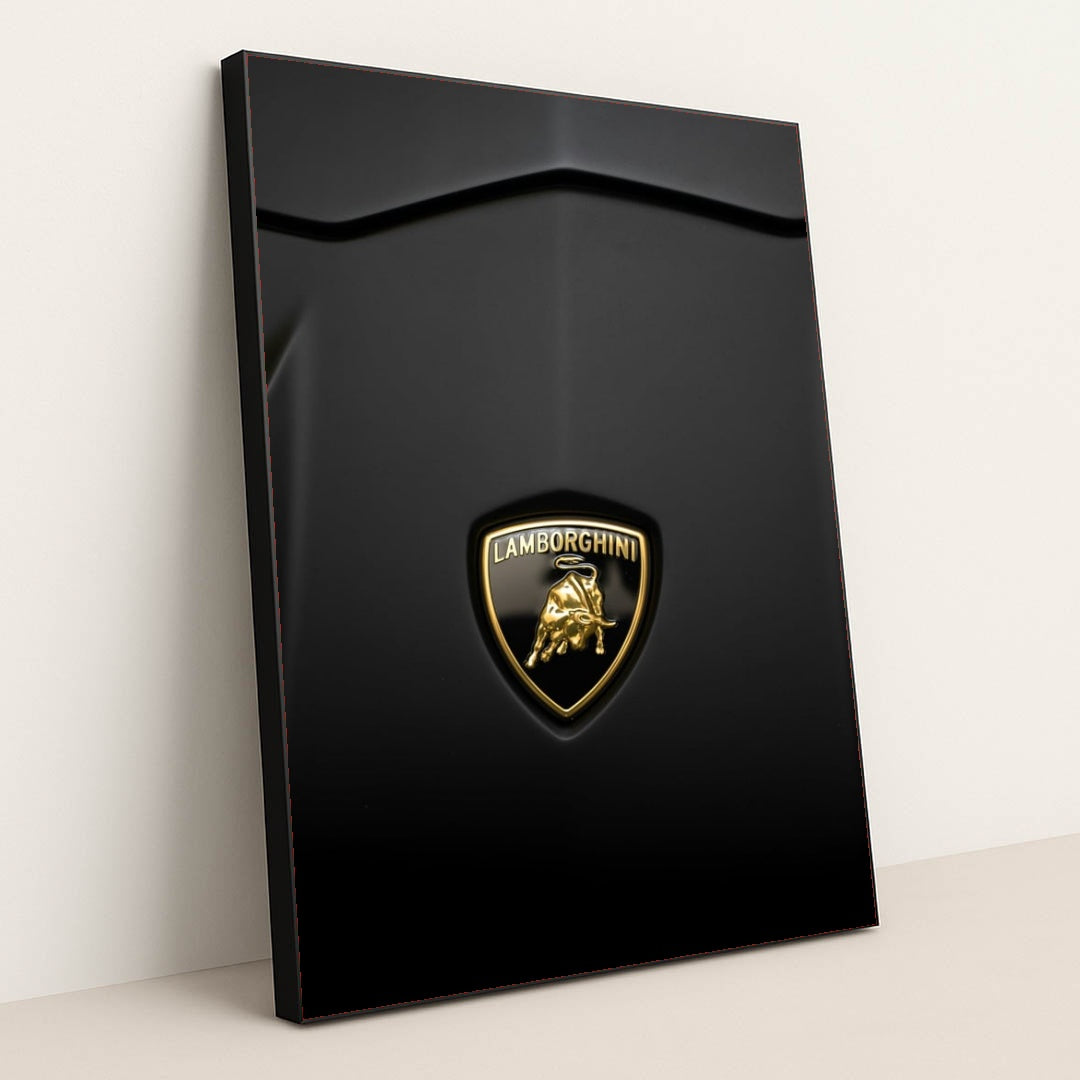 This photo shows a close-up of a Lamborghini badge on a matte black car hood, in a black frame.