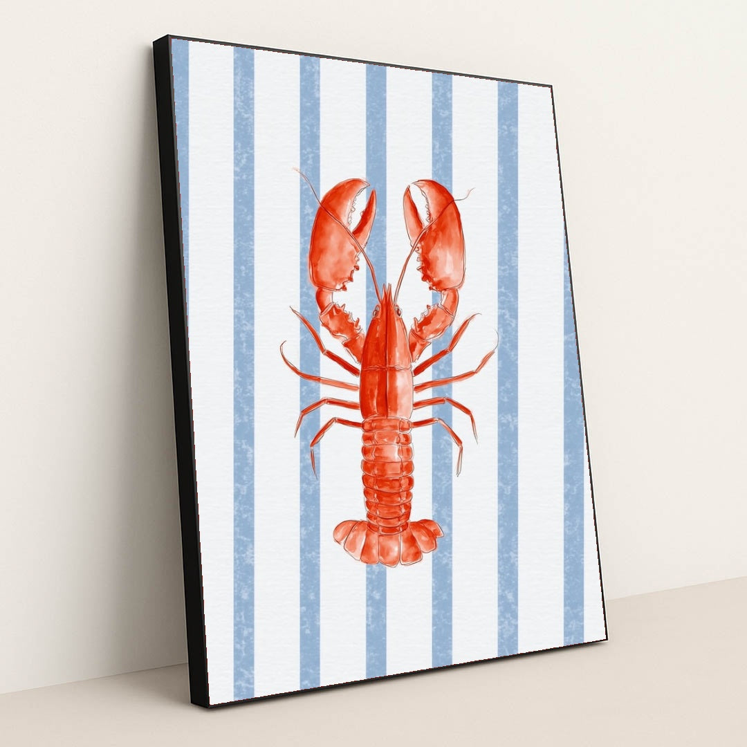 Coastal Crustacean Chic artwork features a vibrant red lobster on a blue and white striped background, displayed in a black frame.