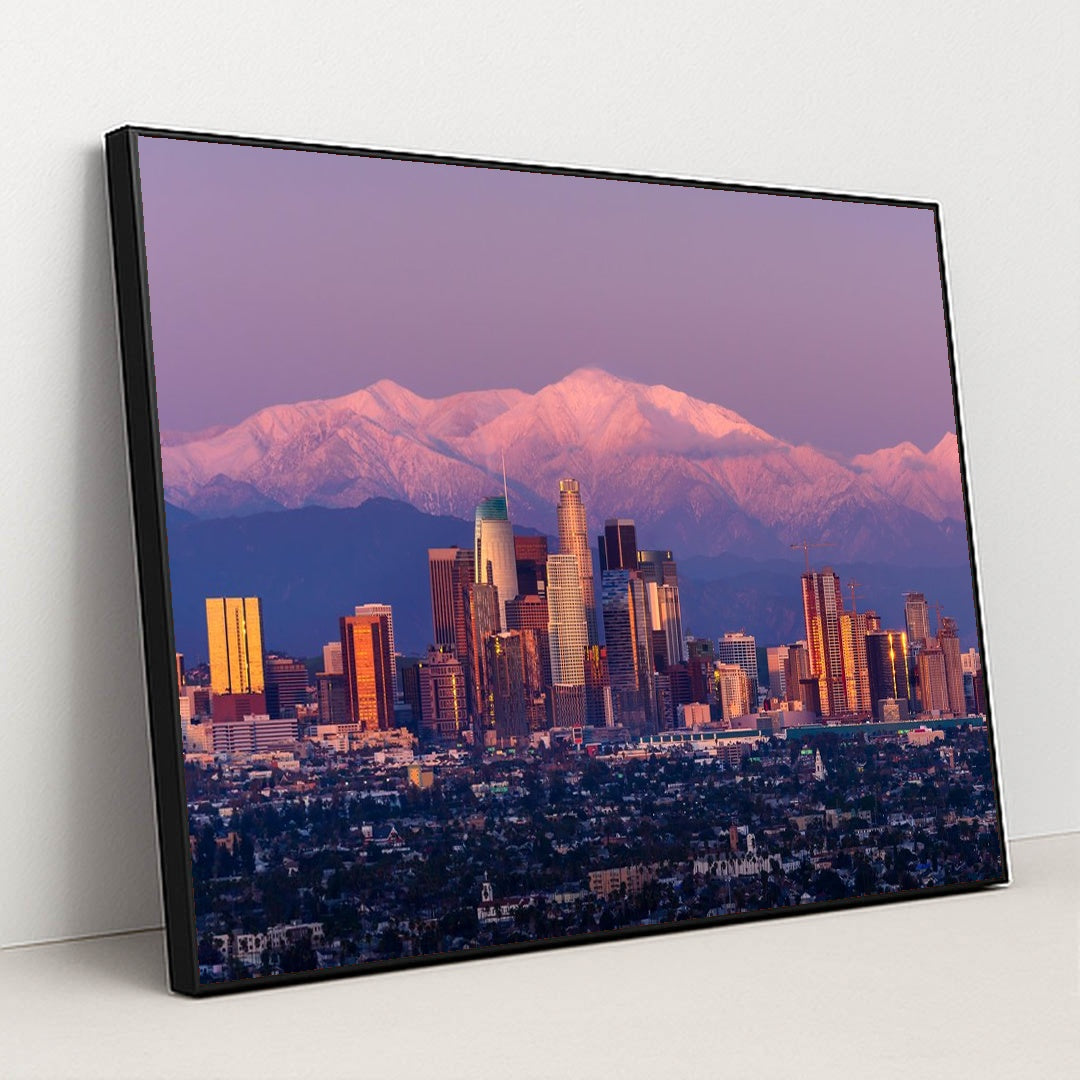 Twilight Skyline: Los Angeles with Snow-Capped Mountains by Anonymous - Black Frame Stretchiez