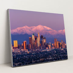 Twilight Skyline: Los Angeles with Snow-Capped Mountains by Anonymous - Silver Frame Stretchiez
