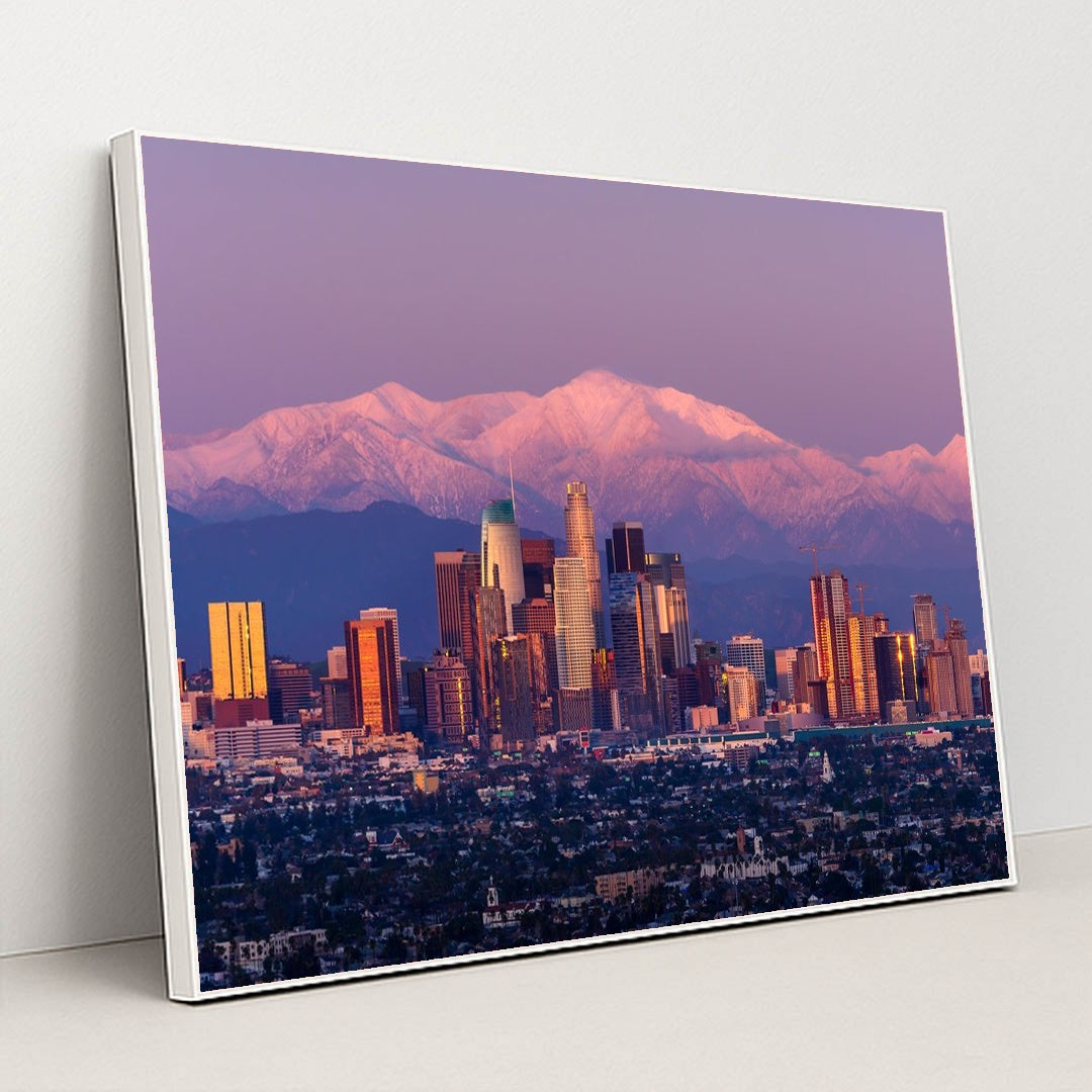 Twilight Skyline: Los Angeles with Snow-Capped Mountains by Anonymous - White Frame Stretchiez