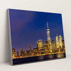 Stunning Lower Manhattan Skyline at Dusk from New Jersey by Anonymous - Silver Frame Stretchiez