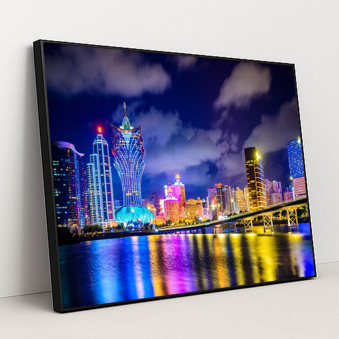 Vibrant Macau Cityscape Illuminated at Night by Anonymous - Black Frame Stretchiez