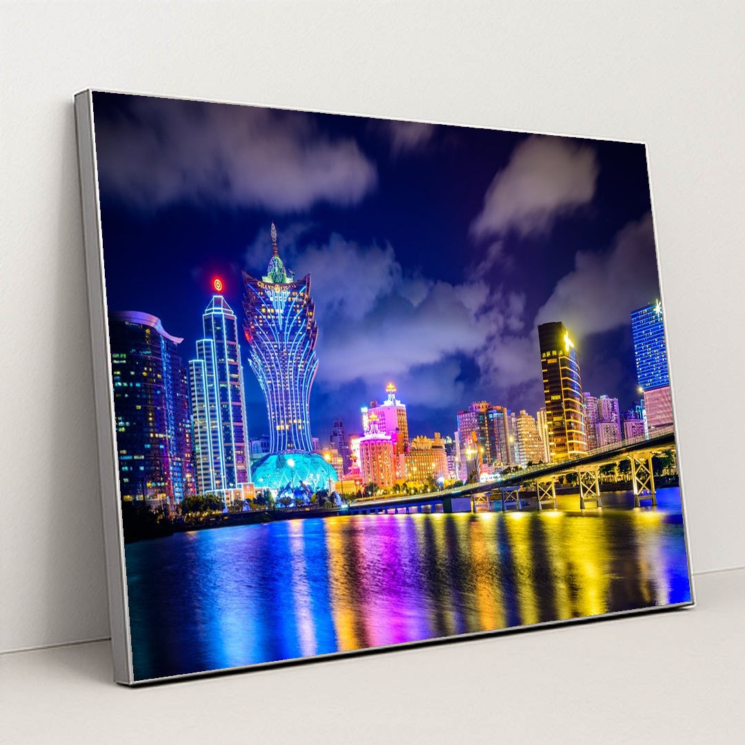 Vibrant Macau Cityscape Illuminated at Night by Anonymous - Silver Frame Stretchiez