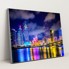 Vibrant Macau Cityscape Illuminated at Night by Anonymous - Silver Frame Stretchiez