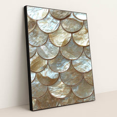 This artwork shows scalloped gold and pearl tiles in an overlapping scale pattern, in a black frame.