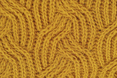 Engin Akyurt - Detailed close-up of a yellow knitted wool pattern, ideal for textile design.