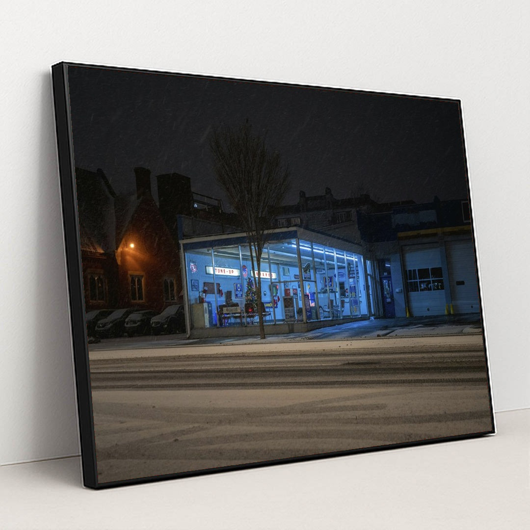 Neon Gas Station on a Snowy Night by Mike Norris - Black Frame Stretchiez