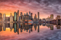 Sunset Serenity: Iconic New York City Skyline at Dusk by Anonymous