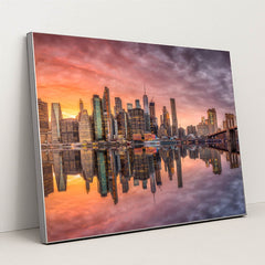 Sunset Serenity: Iconic New York City Skyline at Dusk by Anonymous - Silver Frame Stretchiez