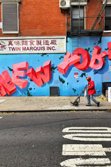Mahdis Mousavi - Man wearing gray denim pants holding hand truck during daytime photo