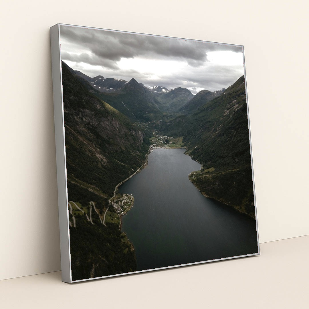 Geirangerfjord Waterway Surrounded by Steep Mountain Slopes in Norway by Roberto Shumski - Silver Frame Stretchiez