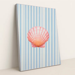 This artwork features a pink seashell on vertical blue and white stripes, in a silver frame.