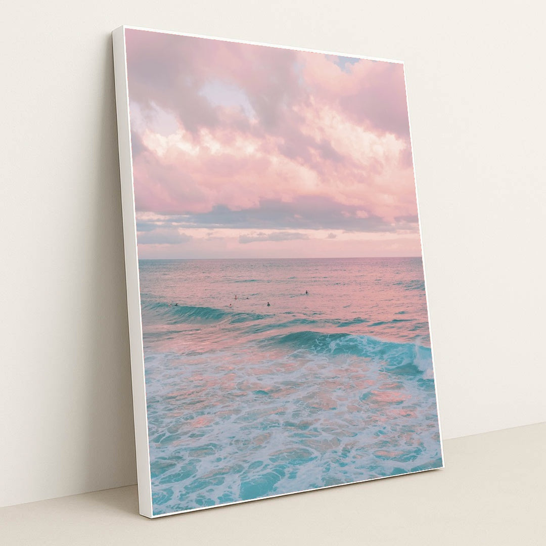 Pink Clouds at Dusk Above Ocean Waves with Surfers by Jess Loiterton - White Frame Stretchiez