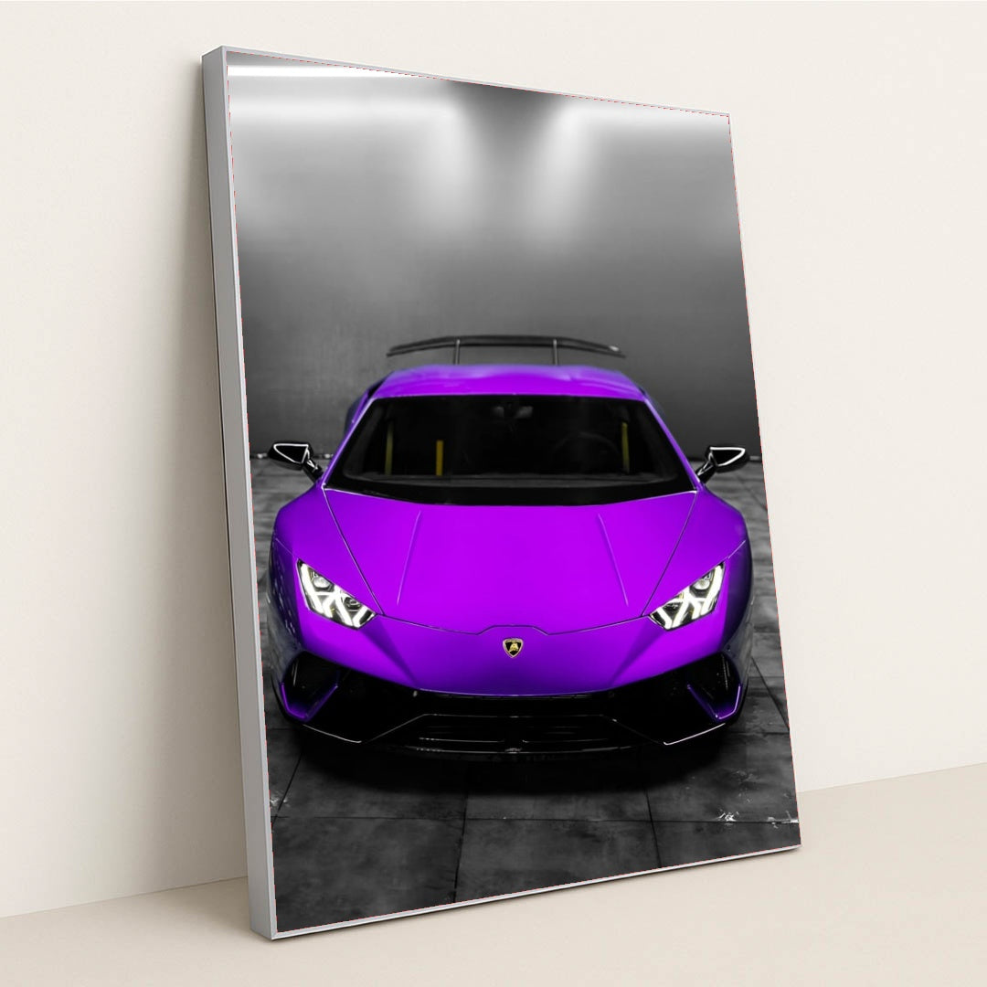 This photo shows the front view of a Lamborghini Huracán in a bright purple color in a modern indoor garage, in a silver frame.