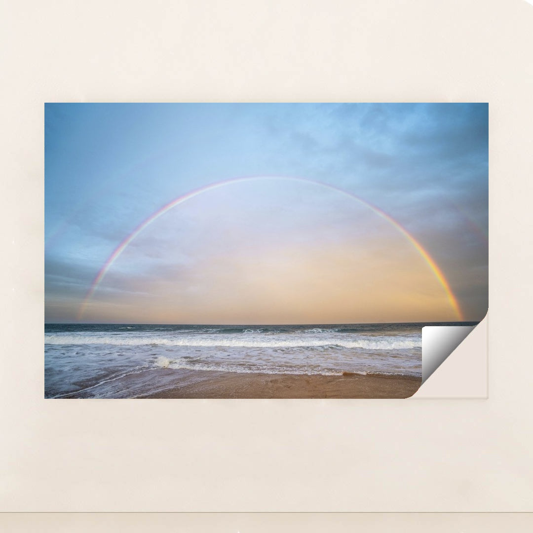 Rainbow Arching Over Ocean Waves at Golden Hour by Ben Mack - Peeliez