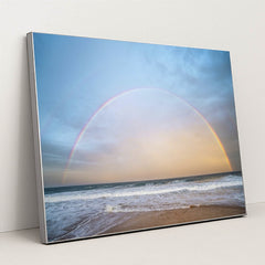 Rainbow Arching Over Ocean Waves at Golden Hour by Ben Mack - Silver Frame Stretchiez