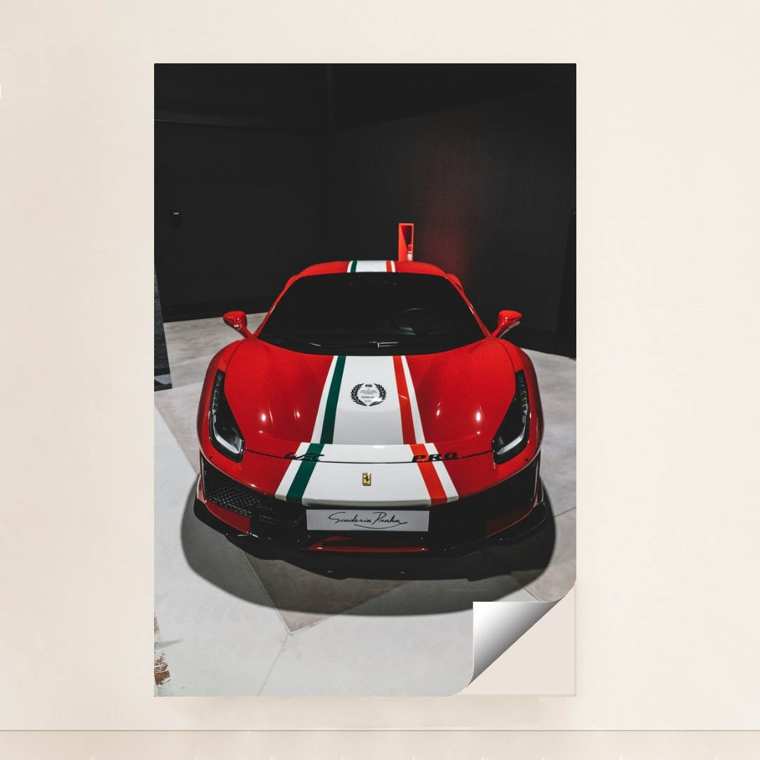 This photo shows the front view of a red Ferrari 488 Pista with Italian flag stripes in an indoor showroom, unframed style.