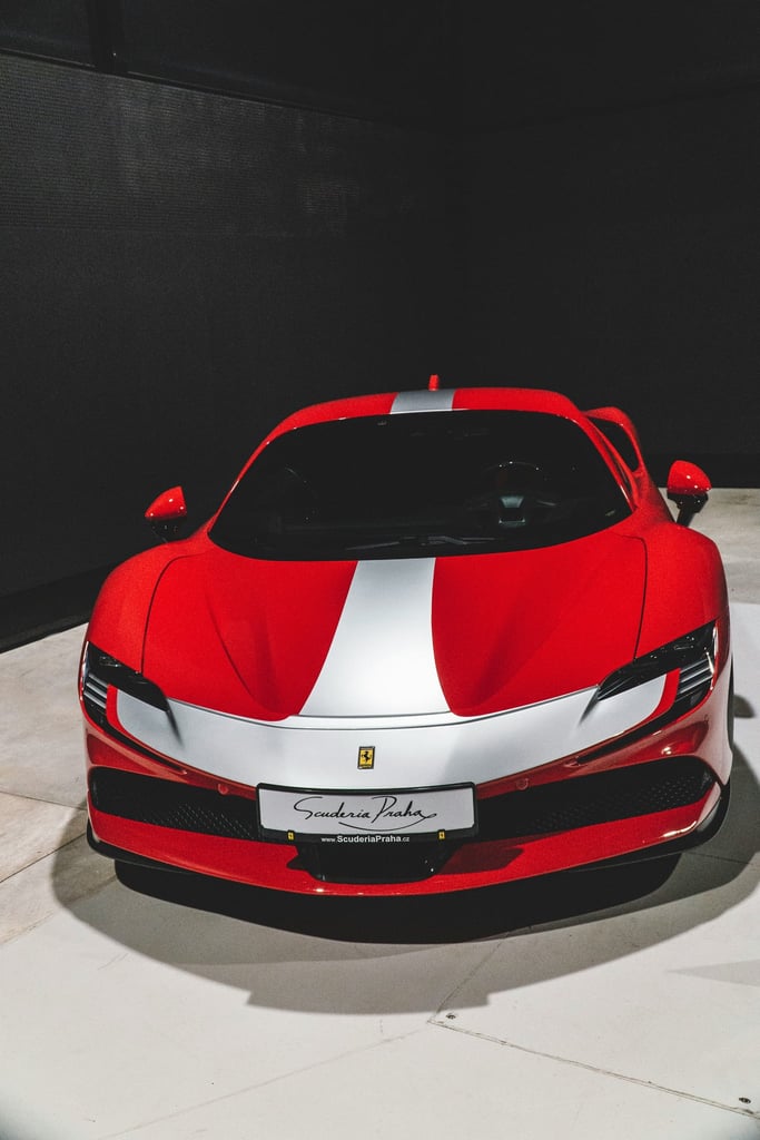 Ferrari SF90 Stradale Beauty in striking red with silver racing stripe, captured as car wall art, emphasizing its modern design.
