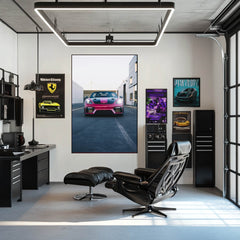 Magenta Porsche 718 Spyder wall art in a modern office with sleek furniture and car-themed posters.