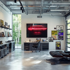 A modern workspace featuring car wall art of a Crimson Porsche 911 in the Rain on the wall.