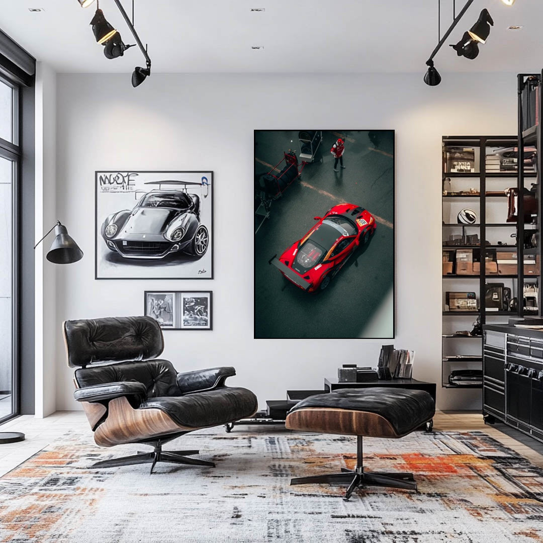 Ferrari GT in the Pits wall art featuring a high-angle shot of a vivid red race car in a stylish living room setting.