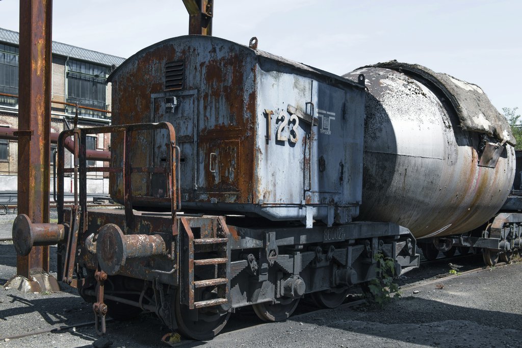 Wolfgang Weiser - Vintage locomotive at German industrial park showcasing rusty, old technology.