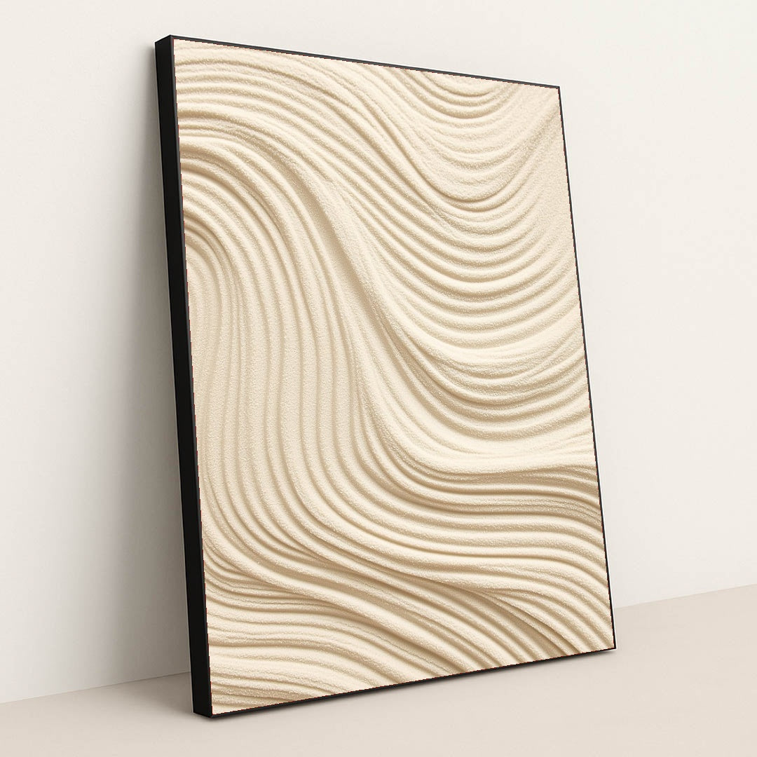 This artwork features smooth, wavy lines of textured tan sand in an abstract pattern, in a black frame.