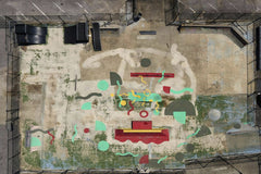 Kelly - Aerial shot of vibrant graffiti artwork on an empty skate park in Nashville, Tennessee.
