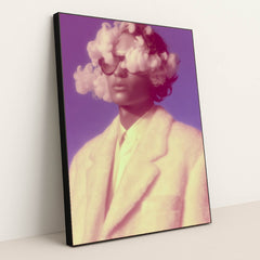 Rosy Haze wall art featuring a surreal portrait of a woman with clouds in her head in oversized sunglasses, framed in black.