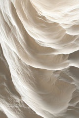 This artwork features abstract sand dunes with soft beige waves and natural shadows.