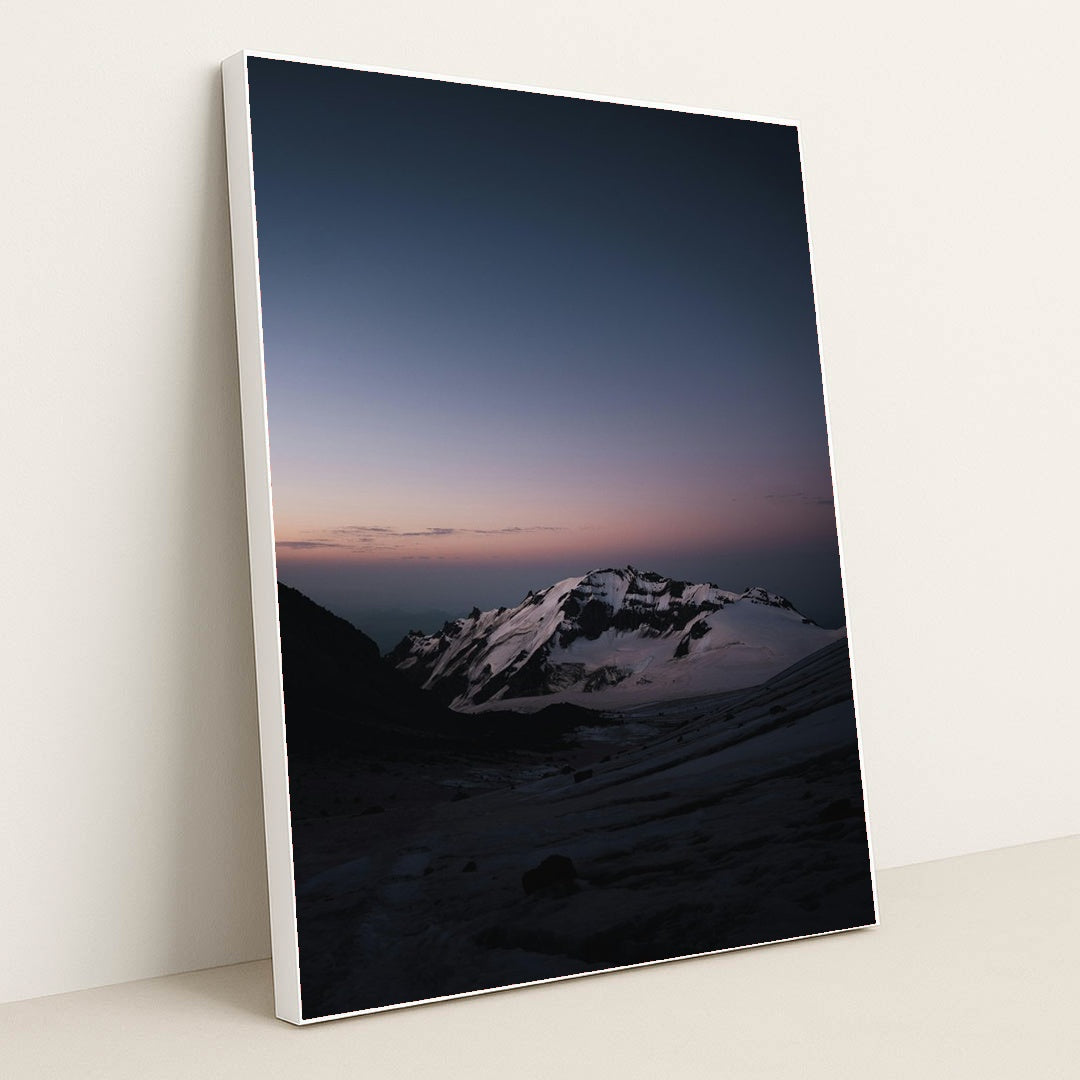 A snow covered mountain with a sky background by Slava Auchynnikau - White Frame Stretchiez