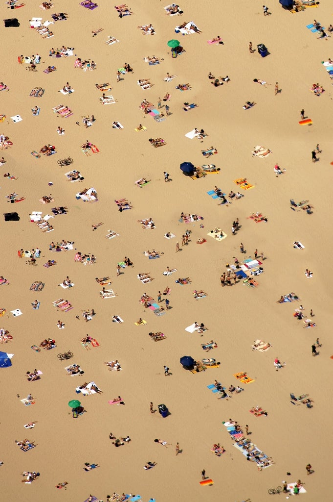 Sunbathers on Sand by Jason Hawke