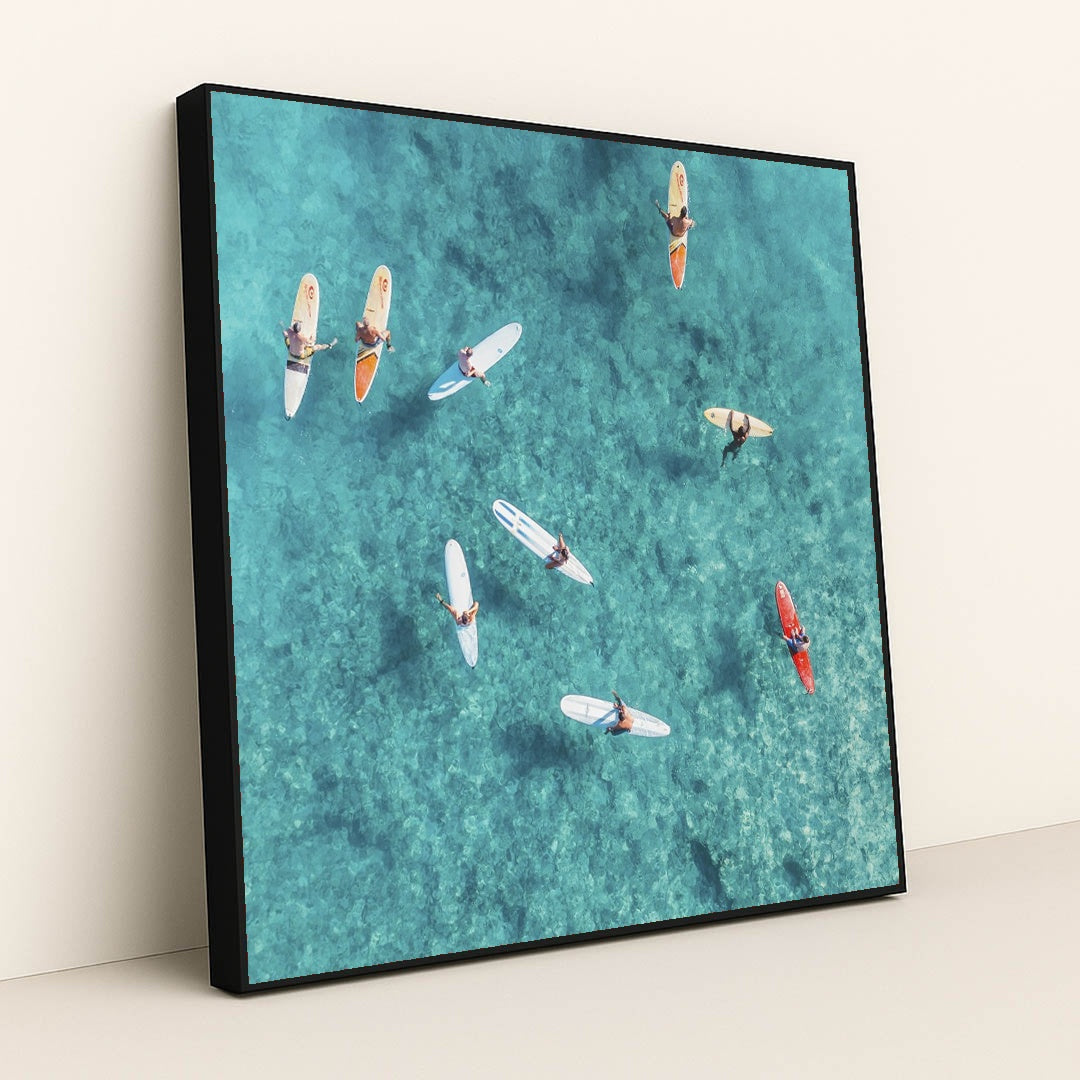 Surfers in Crystal Clear Waters by Jess Loiterton - Black Frame Stretchiez