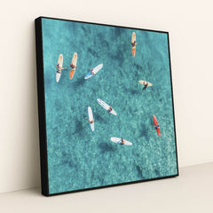 Surfers in Crystal Clear Waters by Jess Loiterton - Black Frame Stretchiez