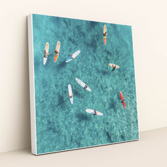 Surfers in Crystal Clear Waters by Jess Loiterton - White Frame Stretchiez