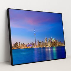 Vibrant Toronto Skyline at Sunset: A Colorful Evening View by Anonymous - Black Frame Stretchiez