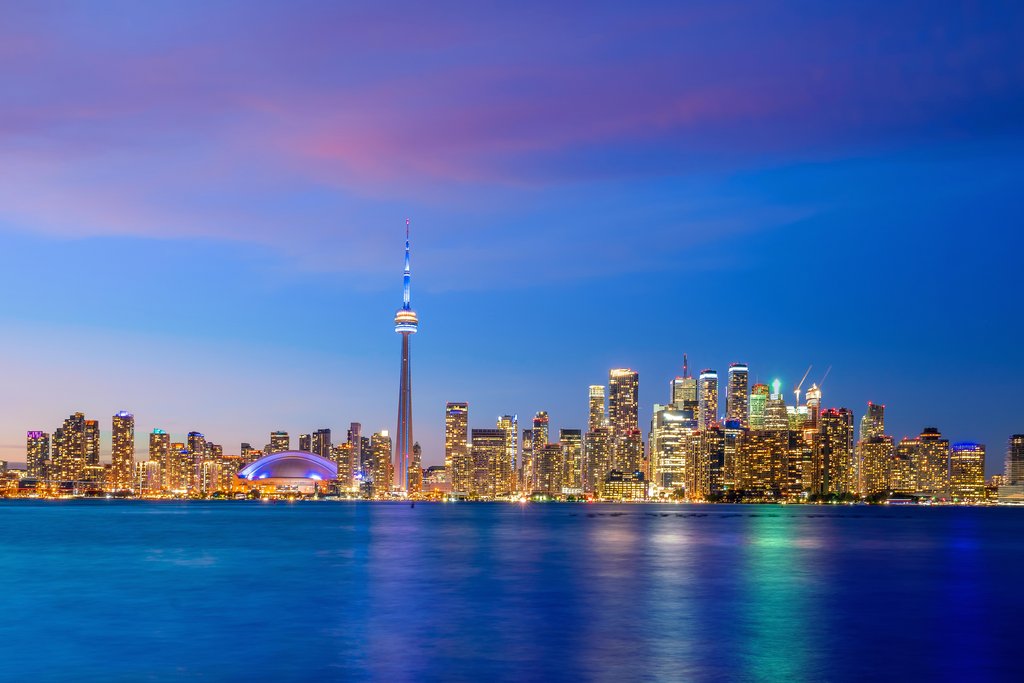 Vibrant Toronto Skyline at Sunset: A Colorful Evening View by Anonymous