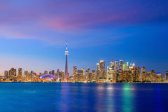 Vibrant Toronto Skyline at Sunset: A Colorful Evening View by Anonymous