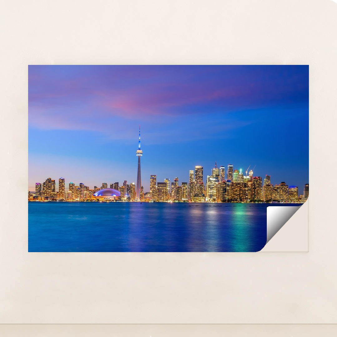Vibrant Toronto Skyline at Sunset: A Colorful Evening View by Anonymous - Peeliez