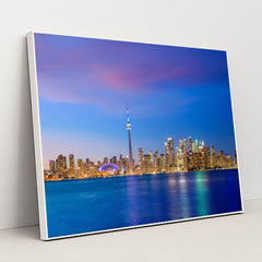 Vibrant Toronto Skyline at Sunset: A Colorful Evening View by Anonymous - White Frame Stretchiez