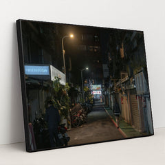 Dimly Lit Alleyway in Taipei with Motorbikes and Cafe Signs at Night by Jimmy Liao - Black Frame Stretchiez