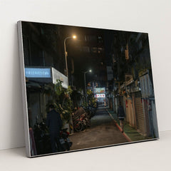 Dimly Lit Alleyway in Taipei with Motorbikes and Cafe Signs at Night by Jimmy Liao - Silver Frame Stretchiez