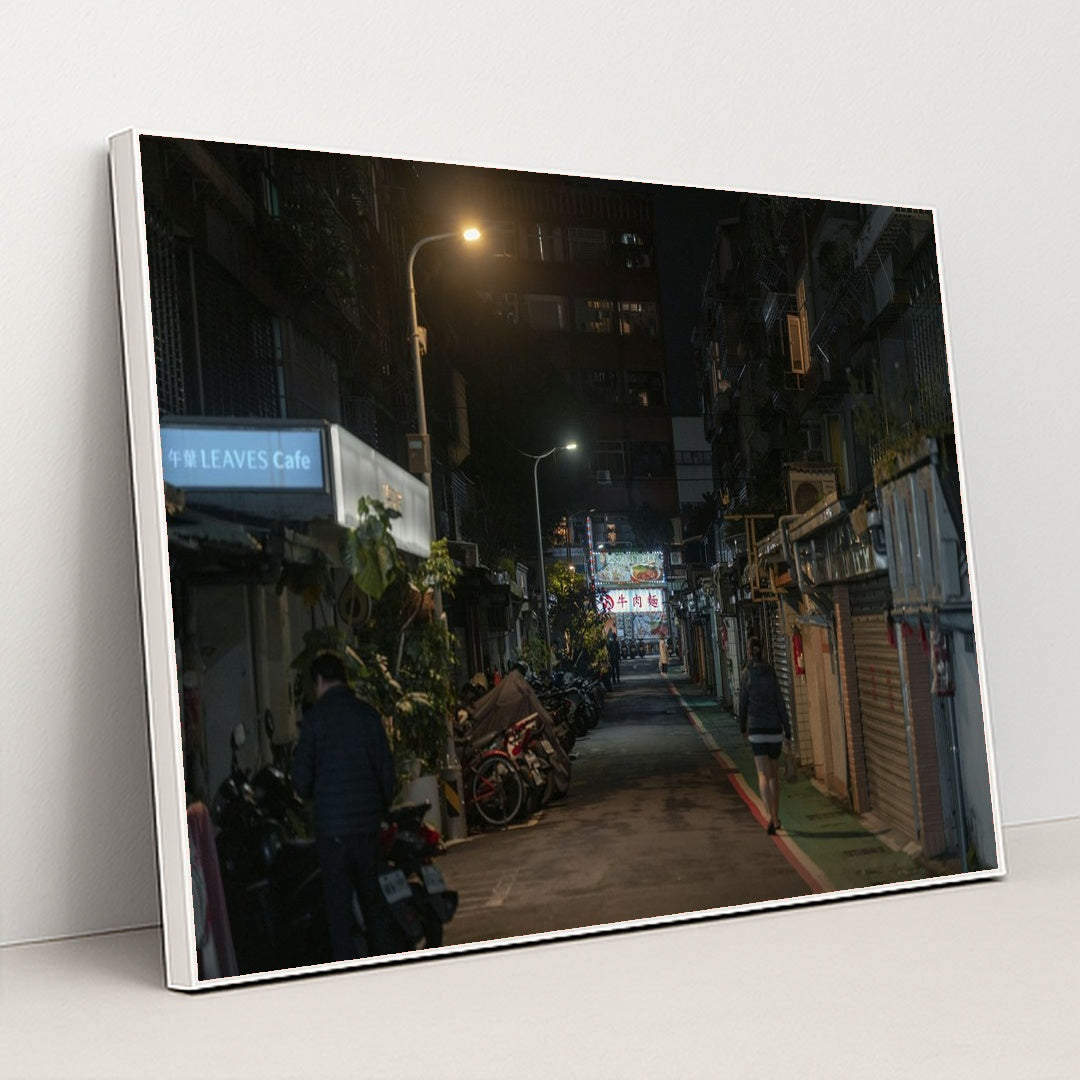 Dimly Lit Alleyway in Taipei with Motorbikes and Cafe Signs at Night by Jimmy Liao - White Frame Stretchiez