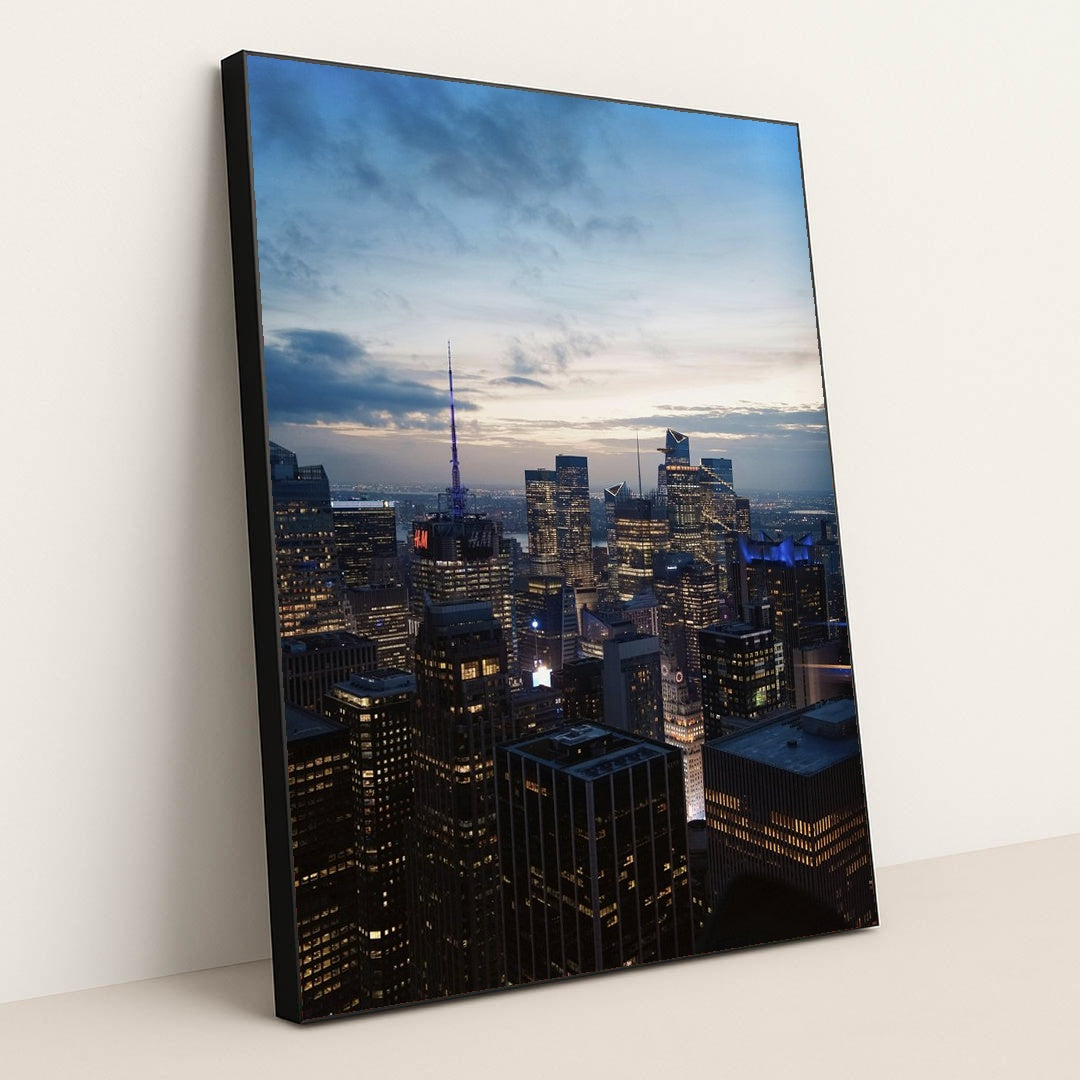 Aerial View of New York City at Dusk by Shojol Islam - Black Frame Stretchiez