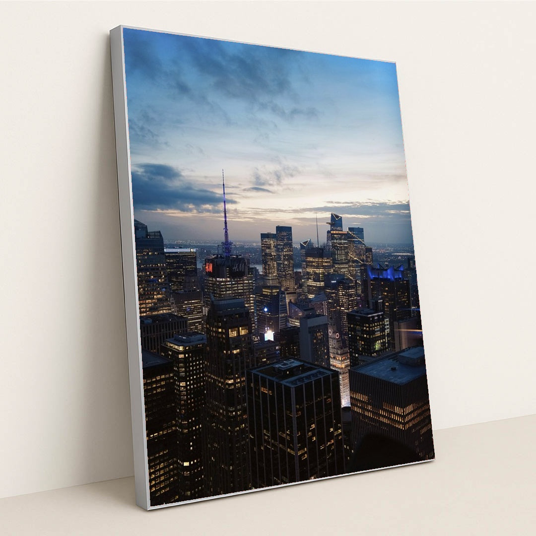 Aerial View of New York City at Dusk by Shojol Islam - Silver Frame Stretchiez