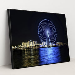 Dubai's Ferris Wheel at Night by Hugo Sykes - Black Frame Stretchiez